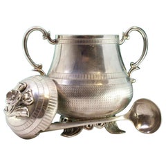 Guilloché silver sugar bowl w/ flower-shaped knob, spoon & 4 cut-out feet