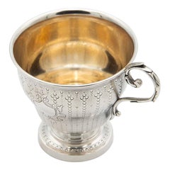 Guilloche silver teacup with pearl engraving and fixed handle