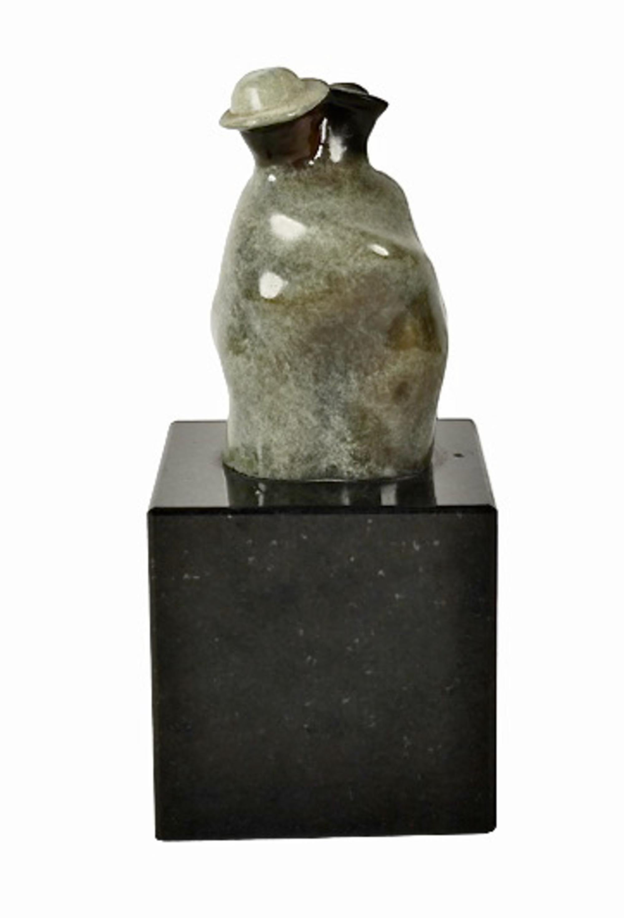 Guilloume Perez (1957 - ) is a Columbian-American Artist who currently resides and has his studio in Santa Fe, New Mexico. This petit abstract sculpture, although small, is quite powerful. It depicts two individuals bound at their hearts and forming