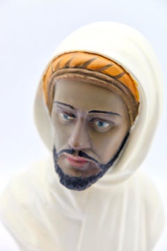 Buste en céramique polychrome représentant une tête arabe, signé Guiseppe Carli