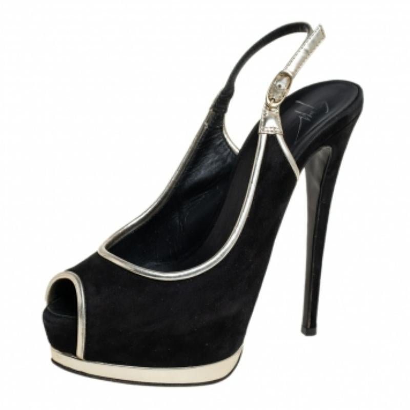 Perfect for special outings, these Guiseppe Zannotti sandals are absolute must-haves. Crafted from quality suede, they come in a classic shade of black that is highlighted with silver leather trims. They are styled with peep-toes, platforms, 15 cm