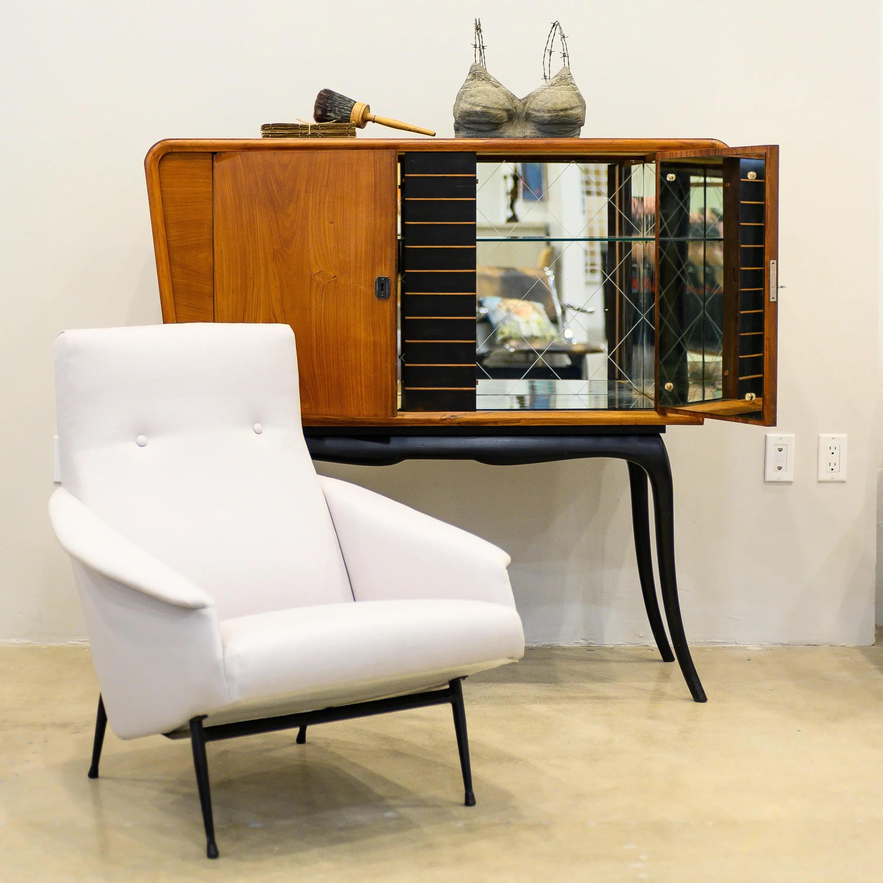 Guiseppi Scapinelli bar cabinet with bevel cut diamond pattern interior.