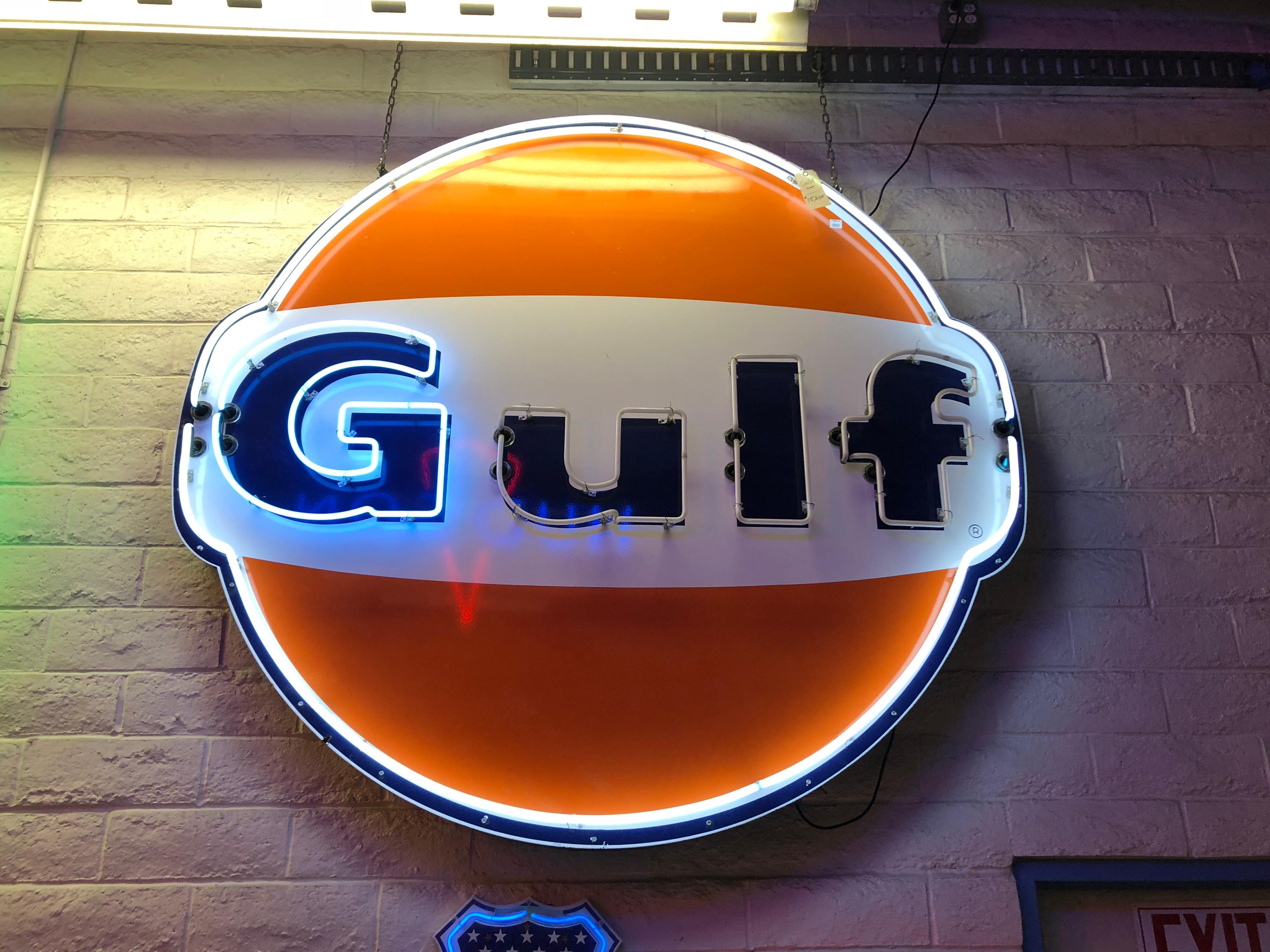 Amazing early 1960s Gulf Oil single sided service station sign with animated neon. Neon lights sequentially to spell out Gulf then flashes.