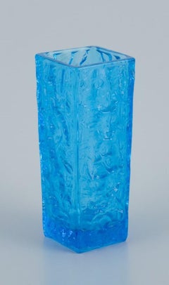Gullaskruf, Sweden, square-shaped glass vase and candlestick in blue art glass.