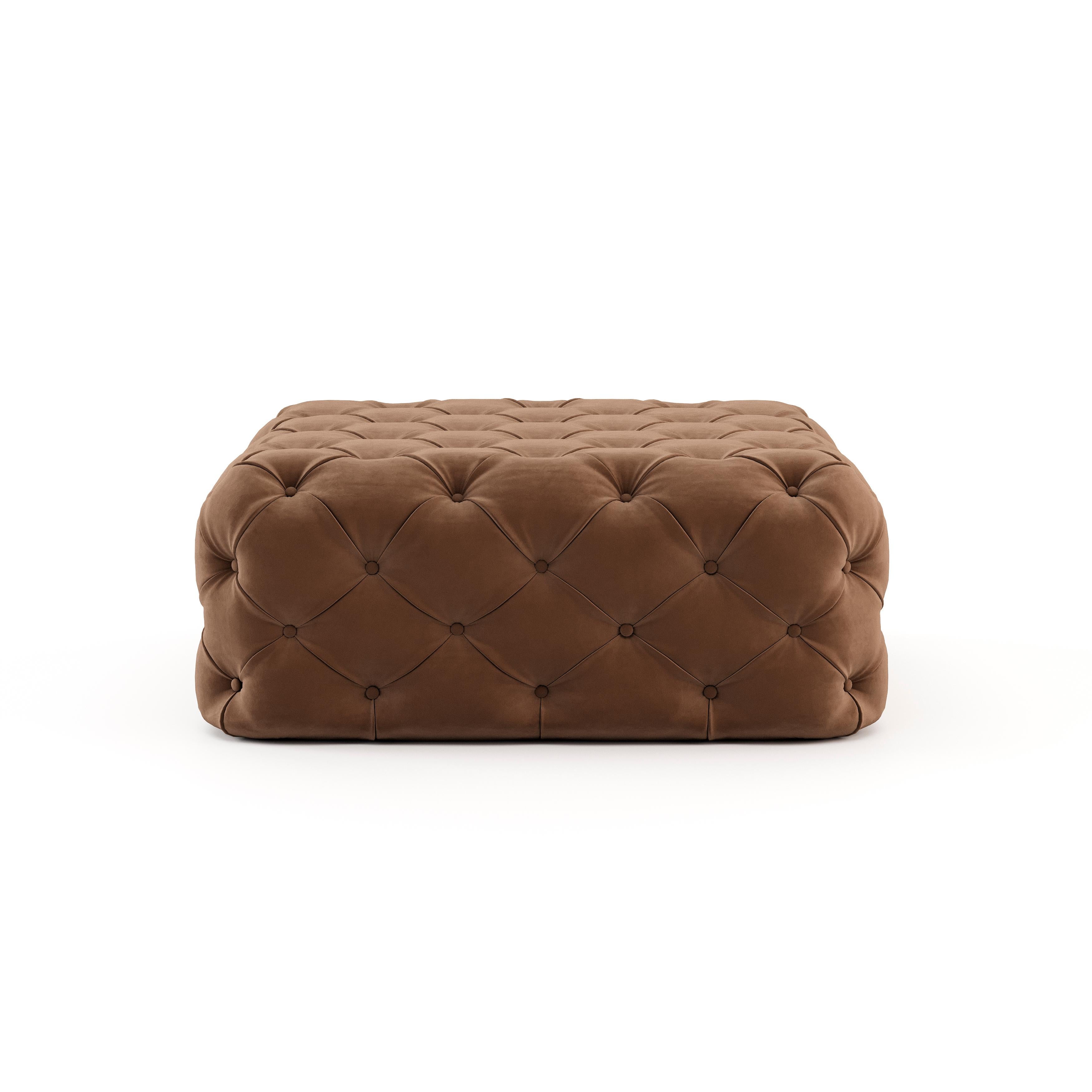 Gum pouf is a statement piece that can be placed in modern bedrooms, functional living rooms or comfortable home cinema areas. Simultaneously comfortable and luxurious, this rectangular ottoman is carefully handmade with the buttoned upholstery