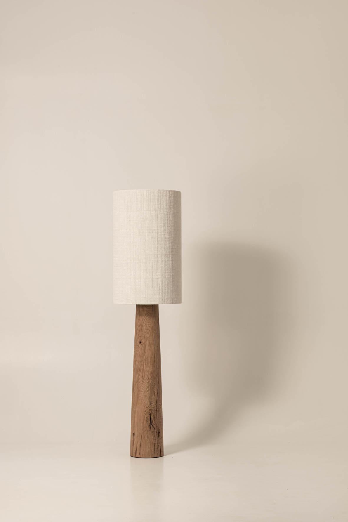 Guma FL4XL lamp by Jeroen De Ruddere
Dimensions: D 40 x H 157 cm
Cord Lenght: 200 cm
Dimmable: Yes
Materials: Oak Brutal nature and textile.

All pieces are CE certified.

Each lamp is handmade so the measurements may differ minimally.