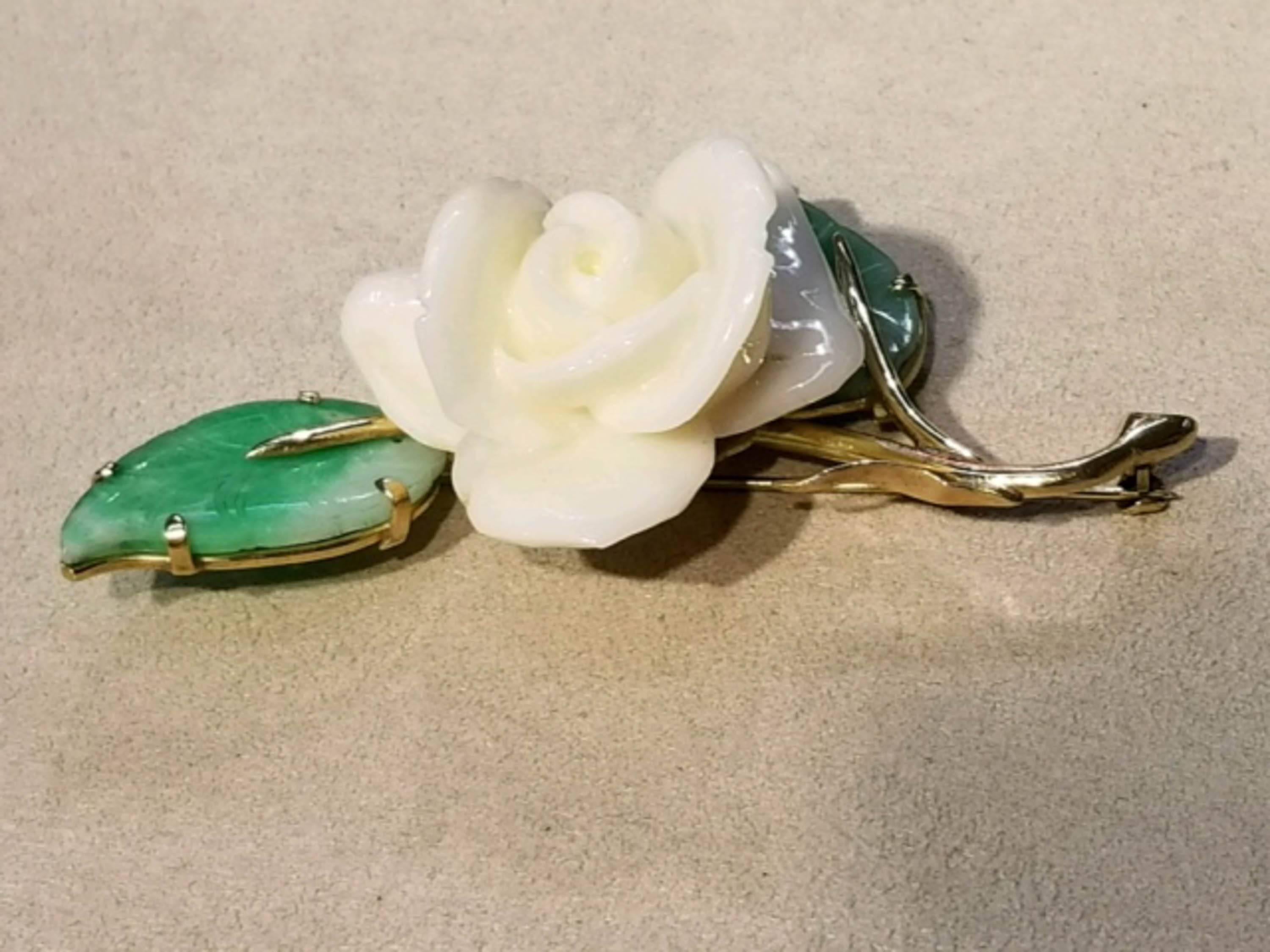 Gump's, 14kt y/g, White Coral and Jade Brooch.

Dimensions: 2 3/4