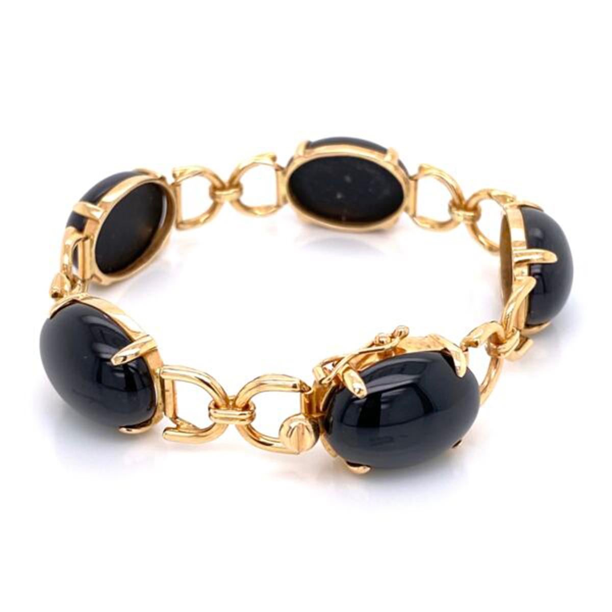 Simply Beautiful! Elegant and finely detailed Link Bracelet, securely Hand set with 5 oval cabochon Black Jade stones. Hand crafted in 14 Karat Yellow Gold. Black Jade is actually Grey Serpentine that's been dyed to have black Jadeite's Beauty,