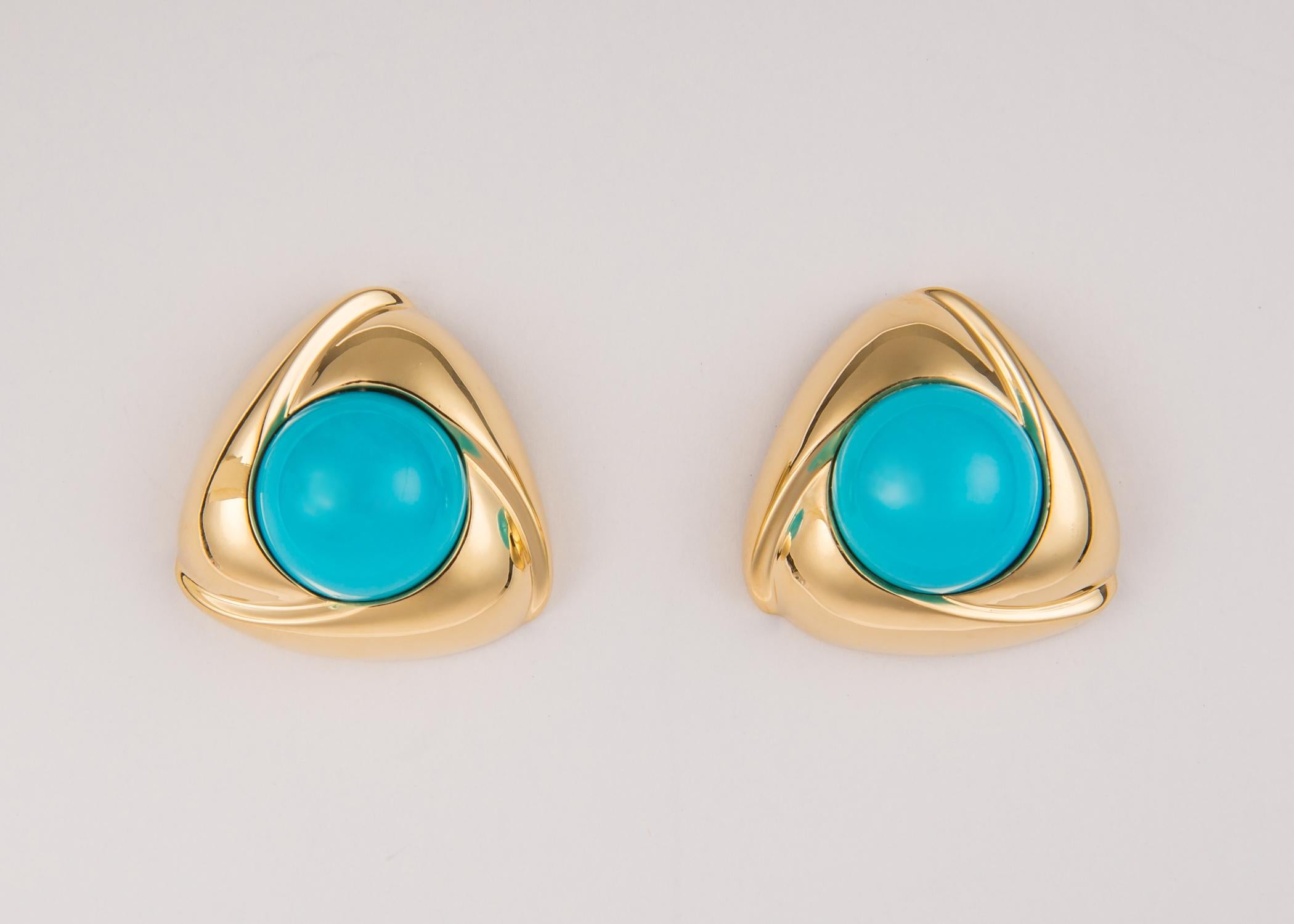 Gump's is famous for their high quality collectable treasures. This is a bold oversized design featuring vivid turquoise centers and rich 18k gold frames. Simply Chic !!!  1 1/8 inches in size.
