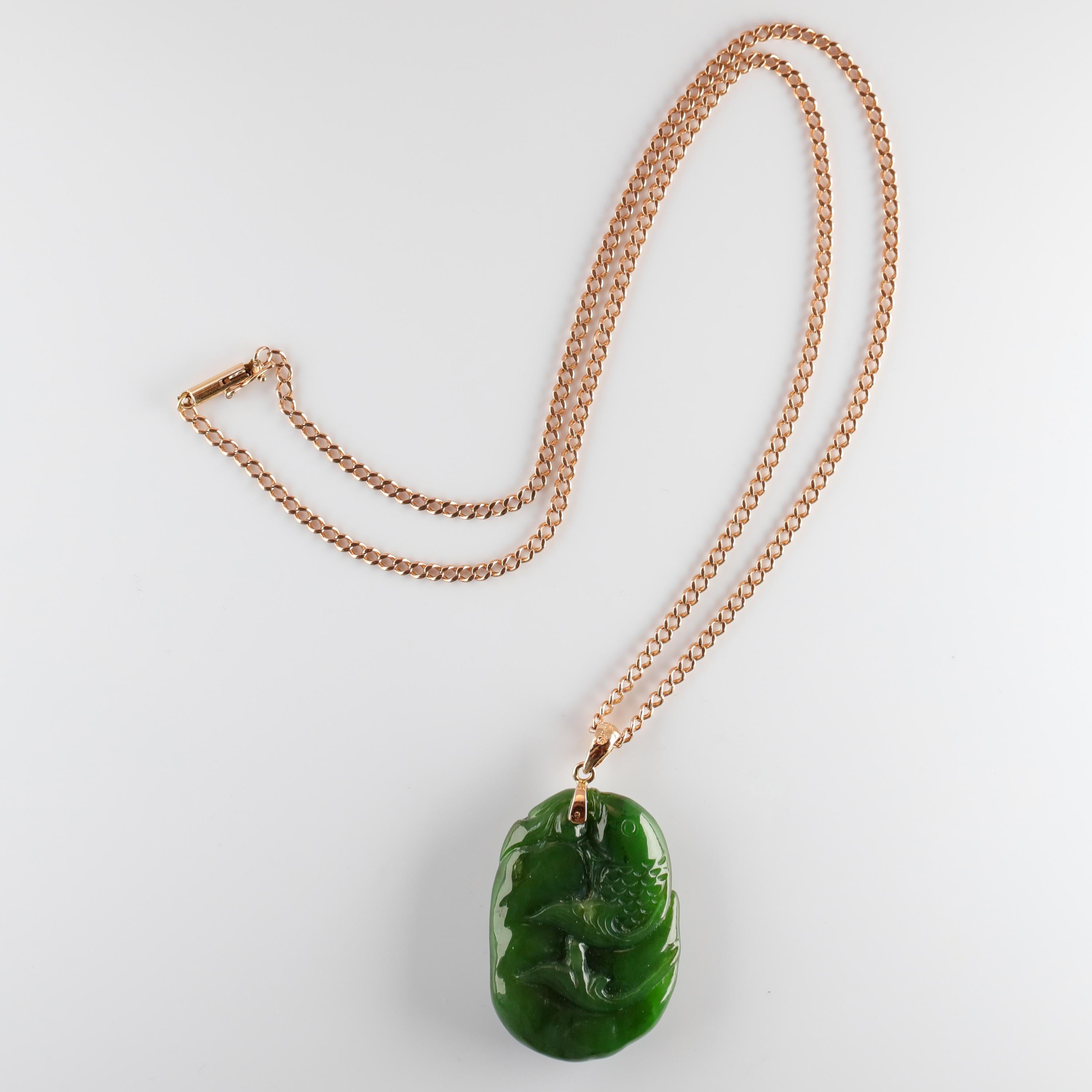 A spectacular and very rare rich green nephrite jade carved pendant from the iconic San Francisco retailer, Gump's. Jade jewelry from Gump's of San Francisco is among the most valued and collectible jade jewelry on the market. It's rare to find