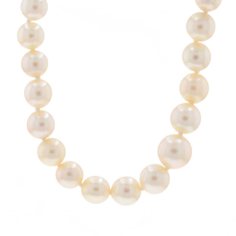Brand: Gump's
Era: Vintage

Metal Content: 14k Yellow Gold

Stone Information

Natural Pink Tourmaline
Carat(s): 6.28ct
Cut: Oval Cabochon

Akoya Pearls

Total Carats: 6.28ct

Style: Knotted Strand
Fastening Type: Tab Box Clasp with Side Safety