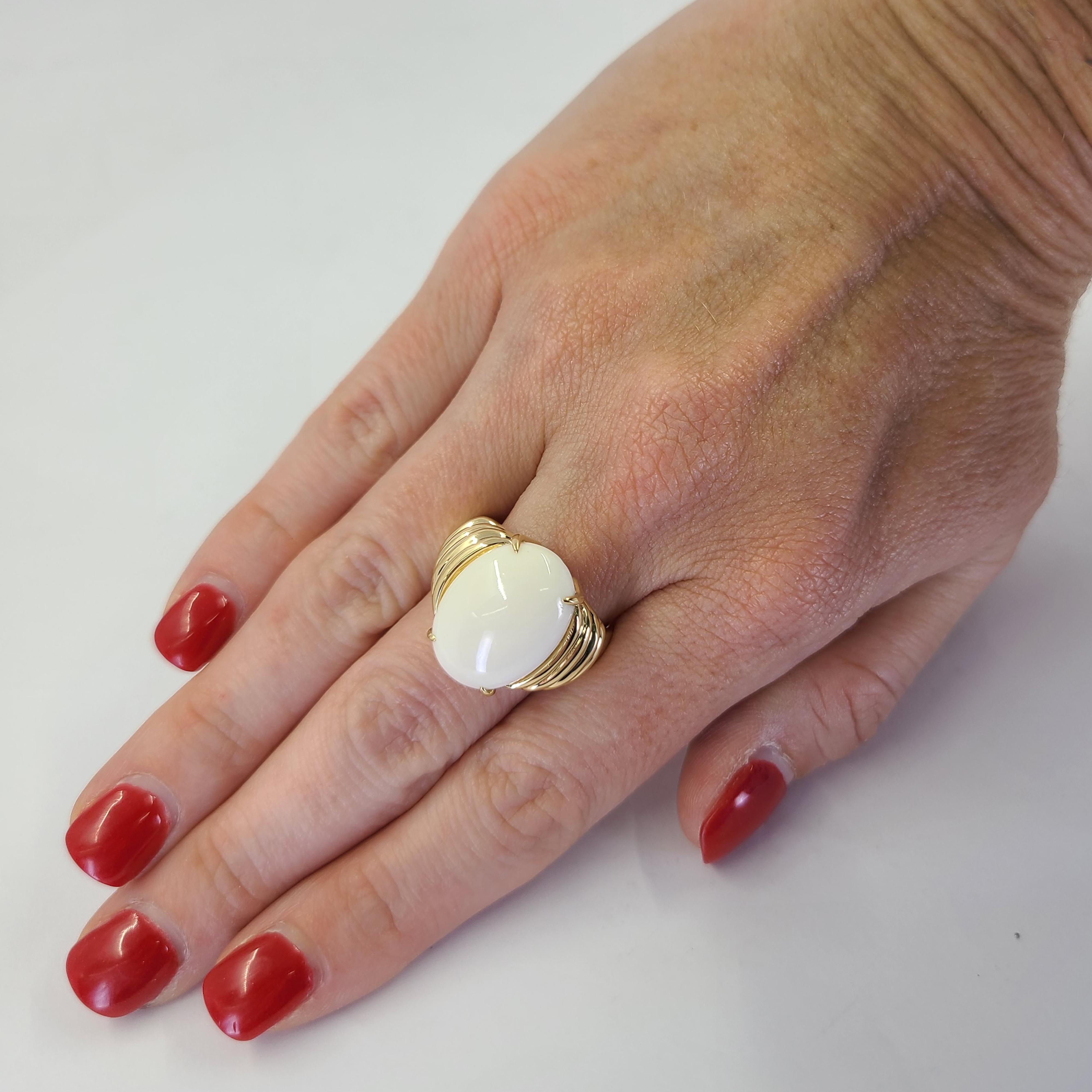 Gump's 18 Karat Yellow Gold Ring Featuring An 18mm x 13mm Oval Cabochon White Coral. Finger Size 7.5; One Sizing Service Included With Purchase. Finished Weight Is 12.7 Grams.