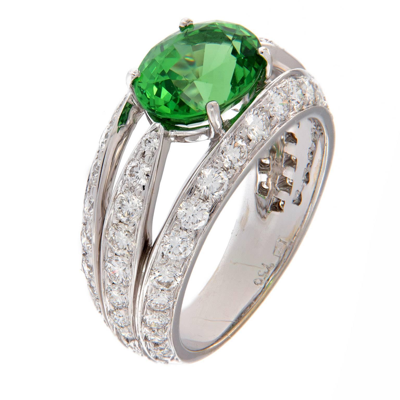 Gumuchian 18K white gold ring from the Luna Collection centers around an oval vivid green tsavorite accented with pave set diamonds. Weighs 6.5 grams. Ring Size 6.5

Tsavorite 3.12 ct
Diamonds 1.45 cttw
