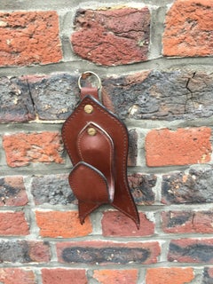 Gun Holder or 2 Leather Paterns in the Style of Jacques Adnet, circa 1950-1960