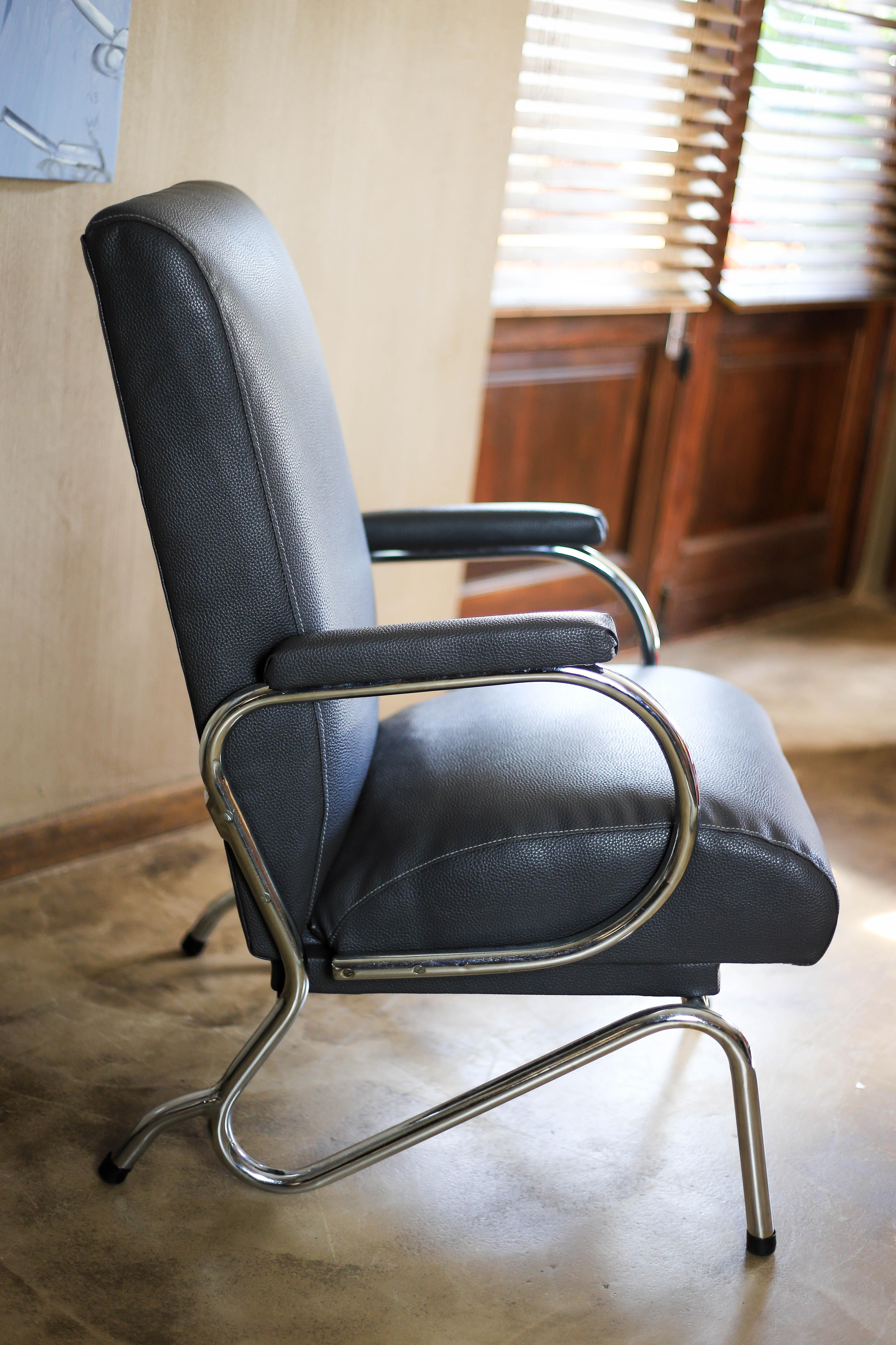 A Bauhaus, chromed tubular steel and faux leather armchair from the 1930s. The frame has been languishing in a storeroom in die South African Boland-province for decades until we found and refurbished it. The frame is re-chromed and the chair is