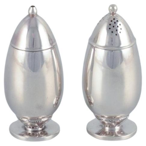 Gundorph Albertus pour Georg Jensen. Salières et poivrières "Cactus".