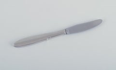 Gundorph Albertus for Georg Jensen. Four long-handled "Mitra" lunch knives.
