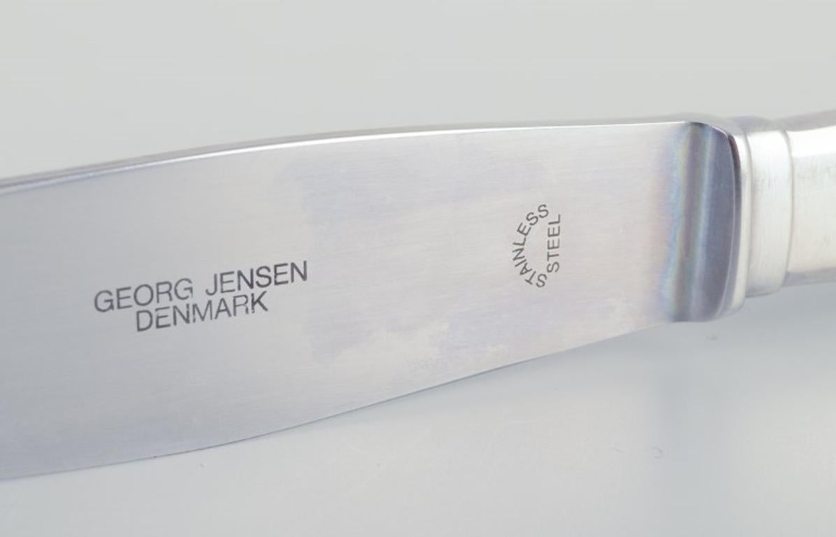 Danish Gundorph Albertus for Georg Jensen. Four Mitra dinner knives in stainless steel