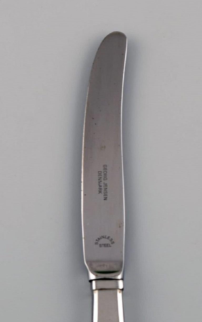 Gundorph Albertus for Georg Jensen. Mitra fruit knife in stainless steel. 1970s. 
11 Knives are available.
Length: 17.5 cm.
In excellent condition.
Stamped.