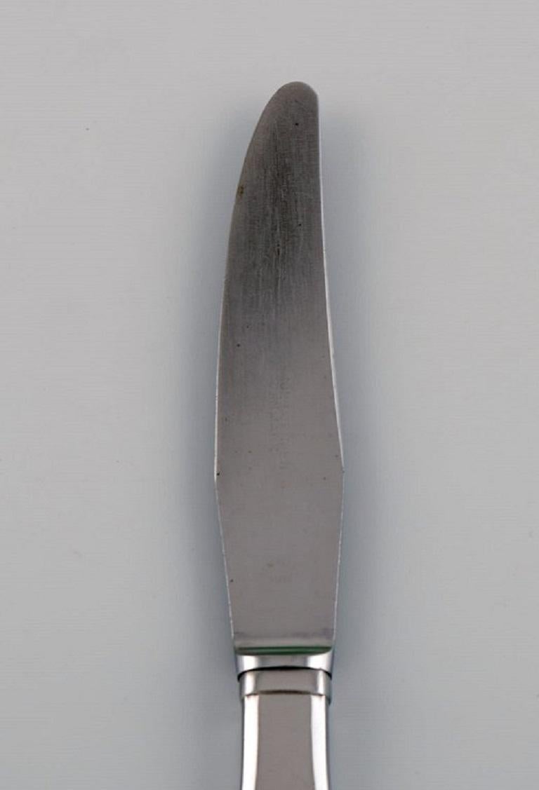 Gundorph Albertus for Georg Jensen. Mitra lunch knife in stainless steel. 1970s. 
Eight knives are available.
Length: 21 cm.
In excellent condition.
Stamped.
