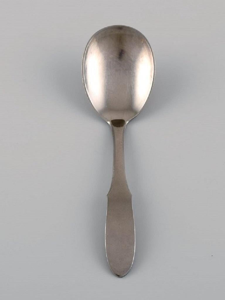 Gundorph Albertus for Georg Jensen. 
Two Mitra jam spoons in stainless steel. 1970s.
Length: 15.5 cm.
In excellent condition.
Stamped.