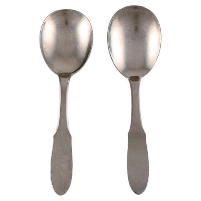 Gundorph Albertus for Georg Jensen, Two Mitra Jam Spoons in Stainless Steel For Sale