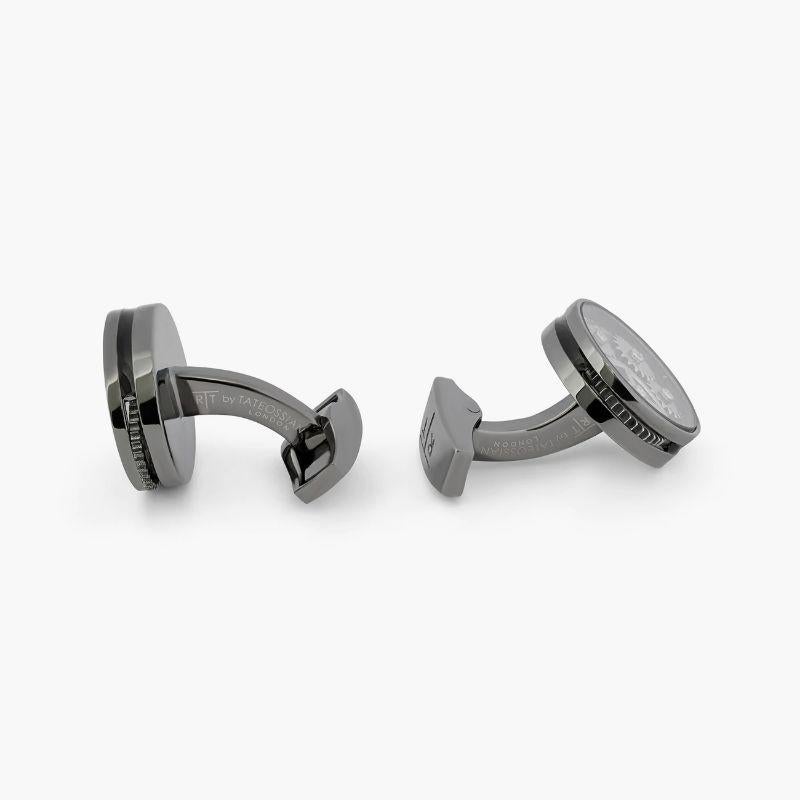 Gunmetal Plated Carousel Gear Cufflinks with Grey Alutex

These cufflink are two years in the making, and are the epitome of Tateossian style. Each gear has been precisely shaped and stamped to fit together in an interlocking pattern. By moving the