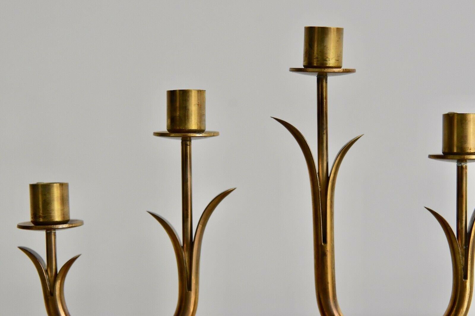 Gunnar Ander candle stick by Ystad Metal. The candleholder is marked on the bottom. The price is for one candleholder.