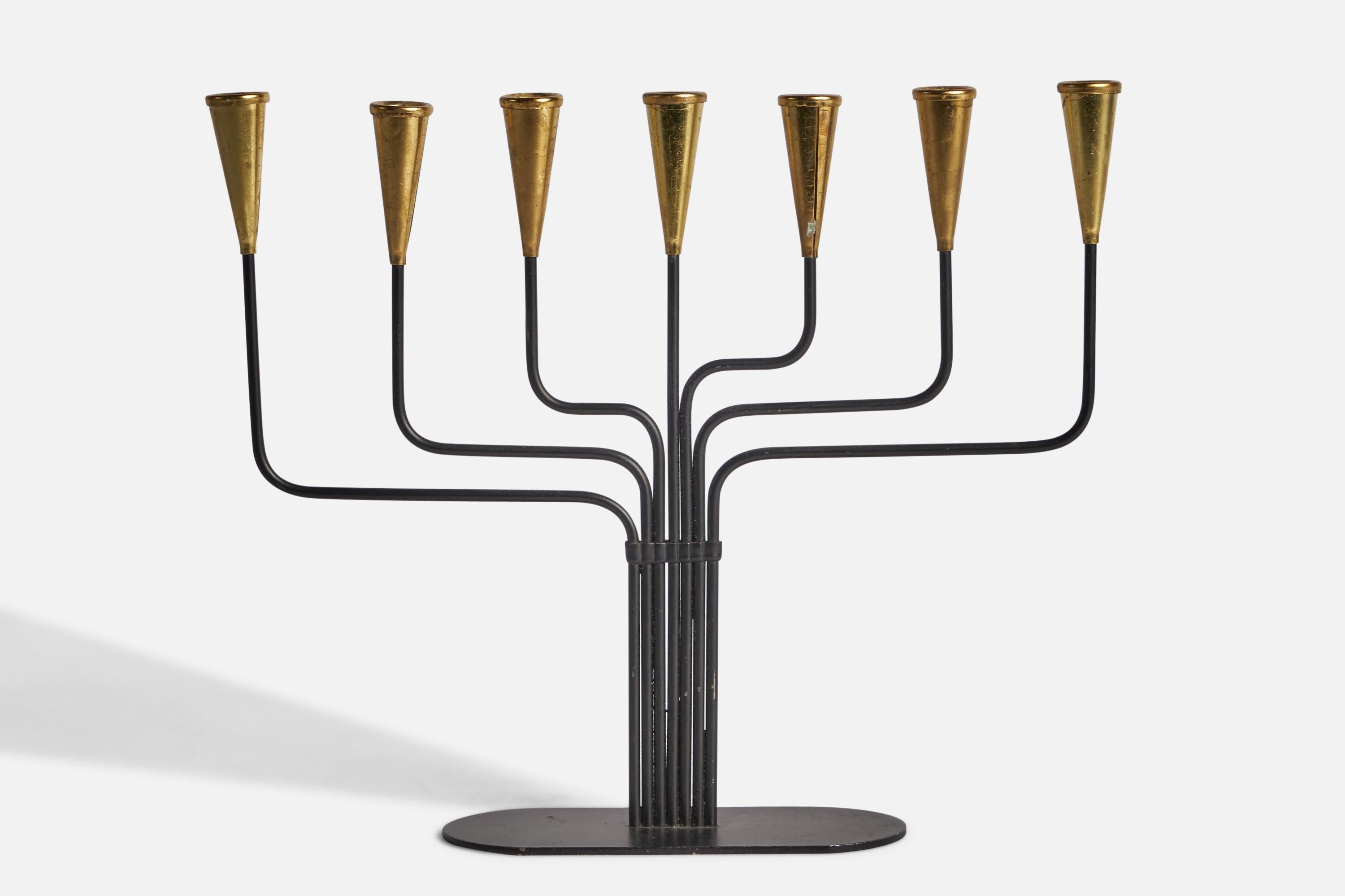 A brass and metal candelabra designed by Gunnar Ander and produced by Ystad-Metall, Sweden, c. 1950s.

Hold 0.35” diameter candle
