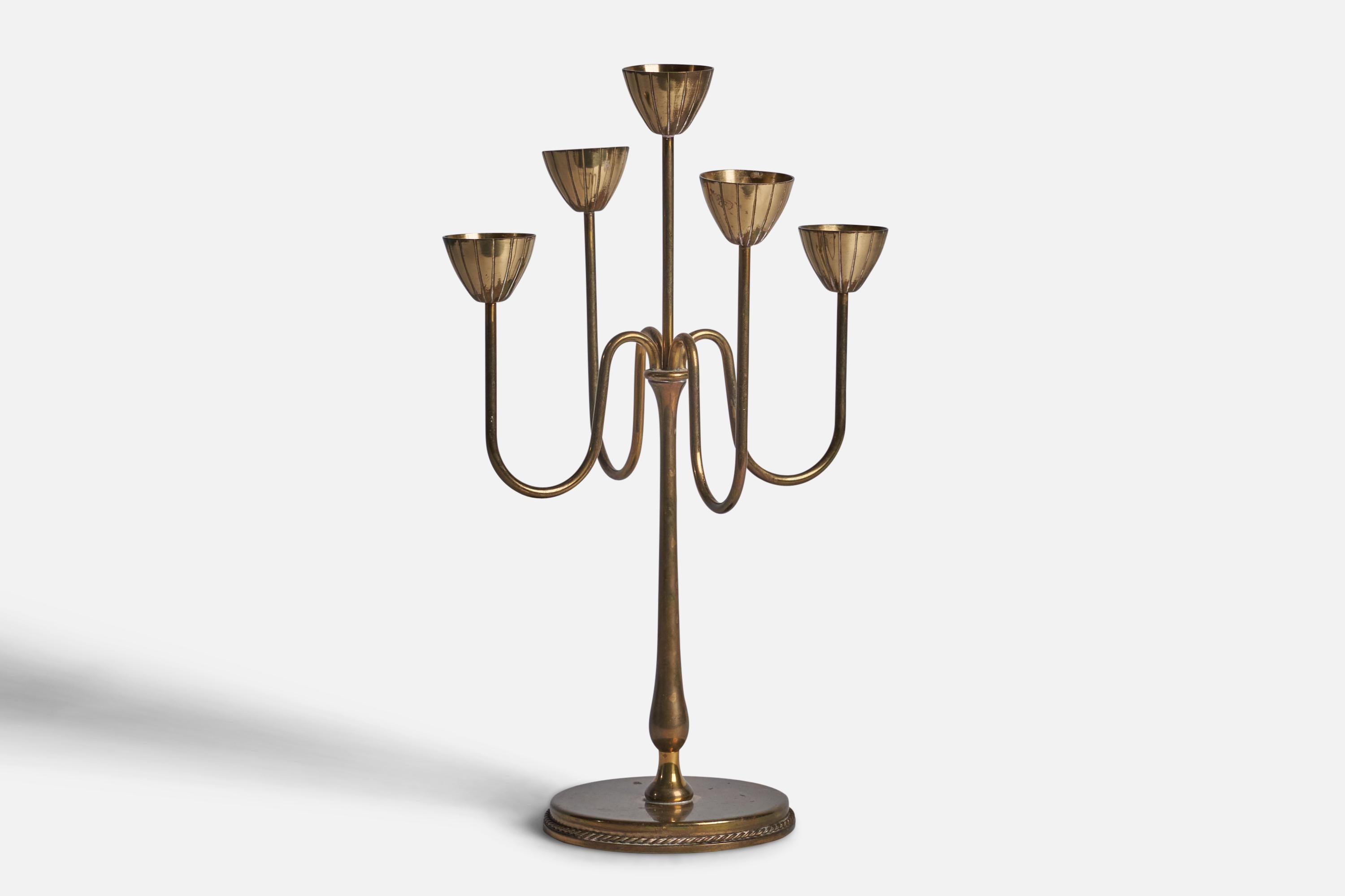 A brass candelabra designed by Gunnar Ander and produced by Ystad-Metall, Sweden, 1950s.

fits 0.5” diameter candles
 