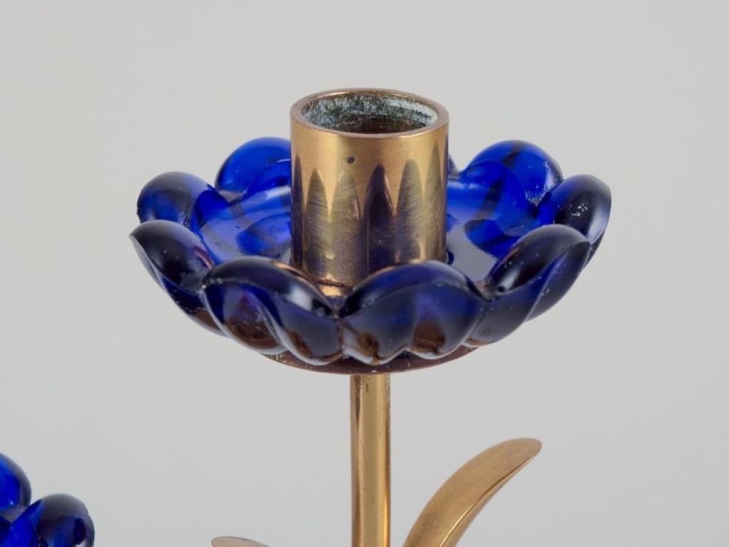 Brass Gunnar Ander for Ystad Metall/ Candlestick holder in brass and blue art glass. For Sale
