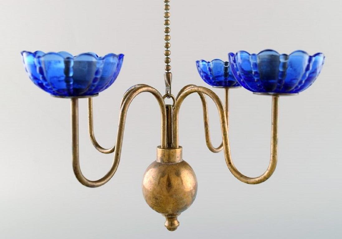 20th Century Gunnar Ander for Ystad Metall. Chandelier for 4 Candles in Brass and Art Glass