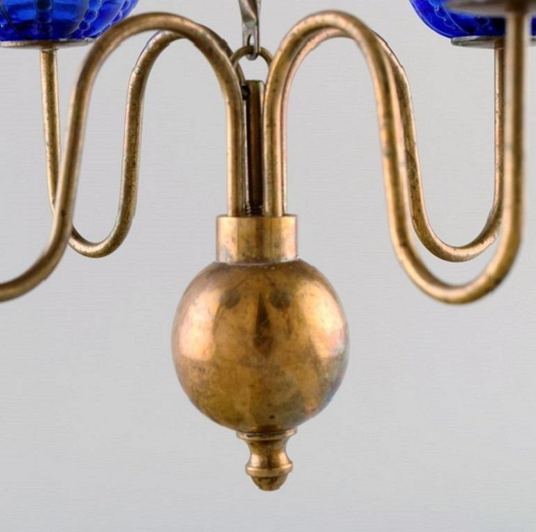 Gunnar Ander for Ystad Metall. Chandelier for 4 Candles in Brass and Art Glass 1