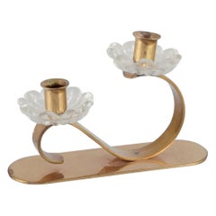 Gunnar Ander for Ystad Metall, Sweden. Candlestick holder in brass and glass.