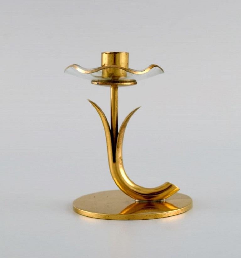 Scandinavian Modern Gunnar Ander for Ystad Metall, Three Candlesticks in Brass and Clear Art Glass For Sale