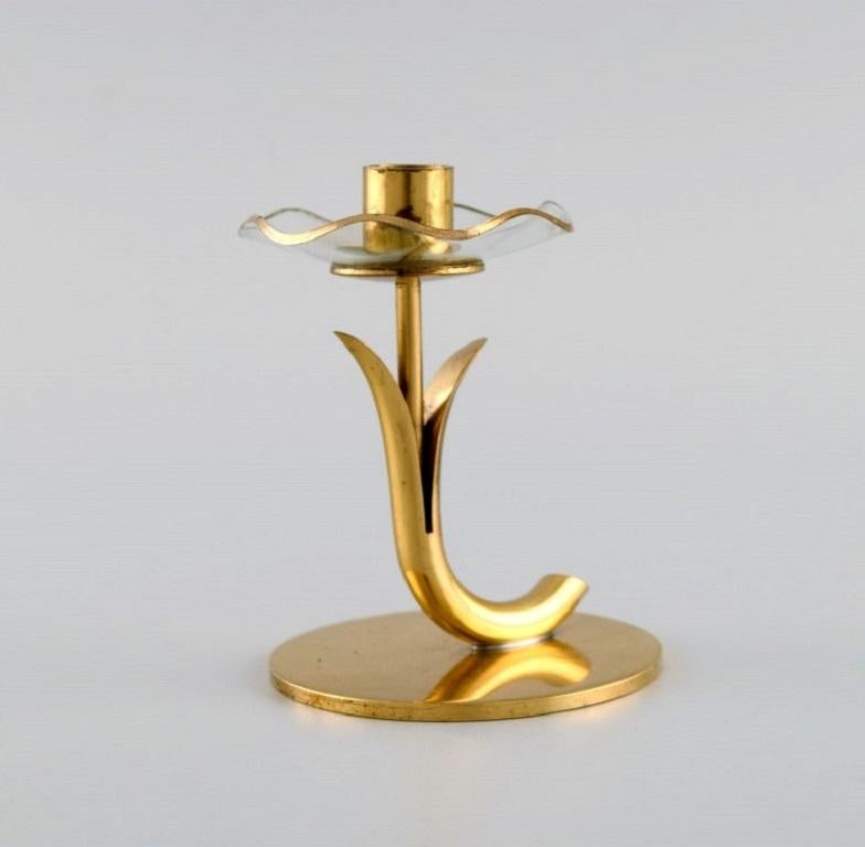 Swedish Gunnar Ander for Ystad Metall, Three Candlesticks in Brass and Clear Art Glass For Sale