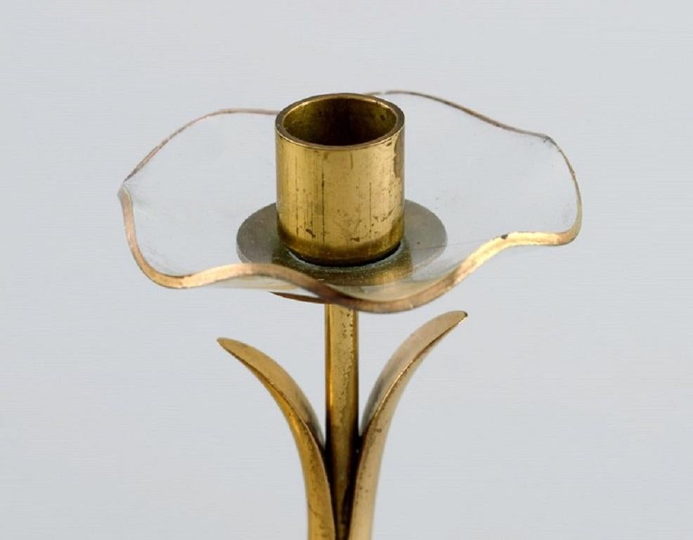 Mid-20th Century Gunnar Ander for Ystad Metall, Three Candlesticks in Brass and Clear Art Glass For Sale