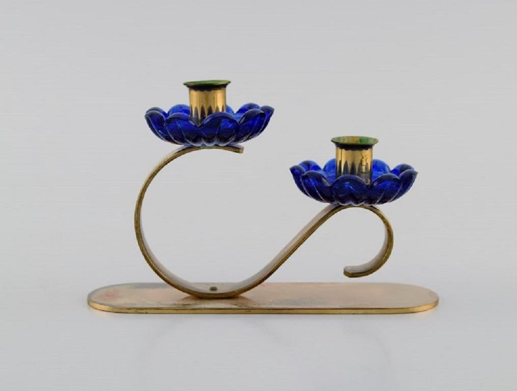 Swedish Gunnar Ander for Ystad Metall, Two Candlesticks in Brass and Blue Art Glass