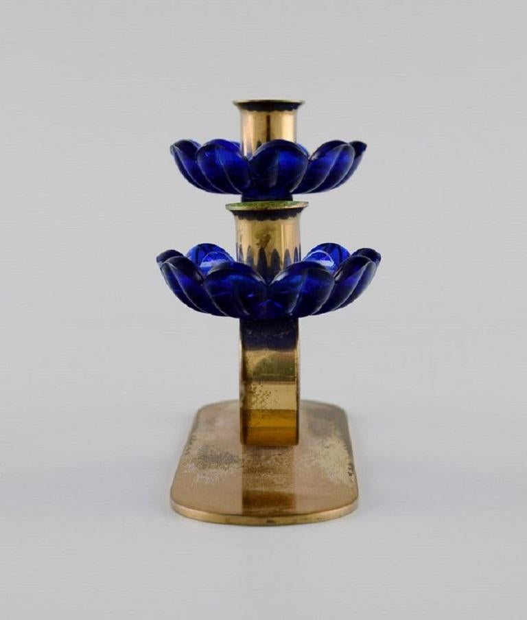 Mid-20th Century Gunnar Ander for Ystad Metall, Two Candlesticks in Brass and Blue Art Glass