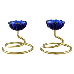 Gunnar Ander for Ystad Metall, Two Candlesticks in Brass and Blue Art Glass