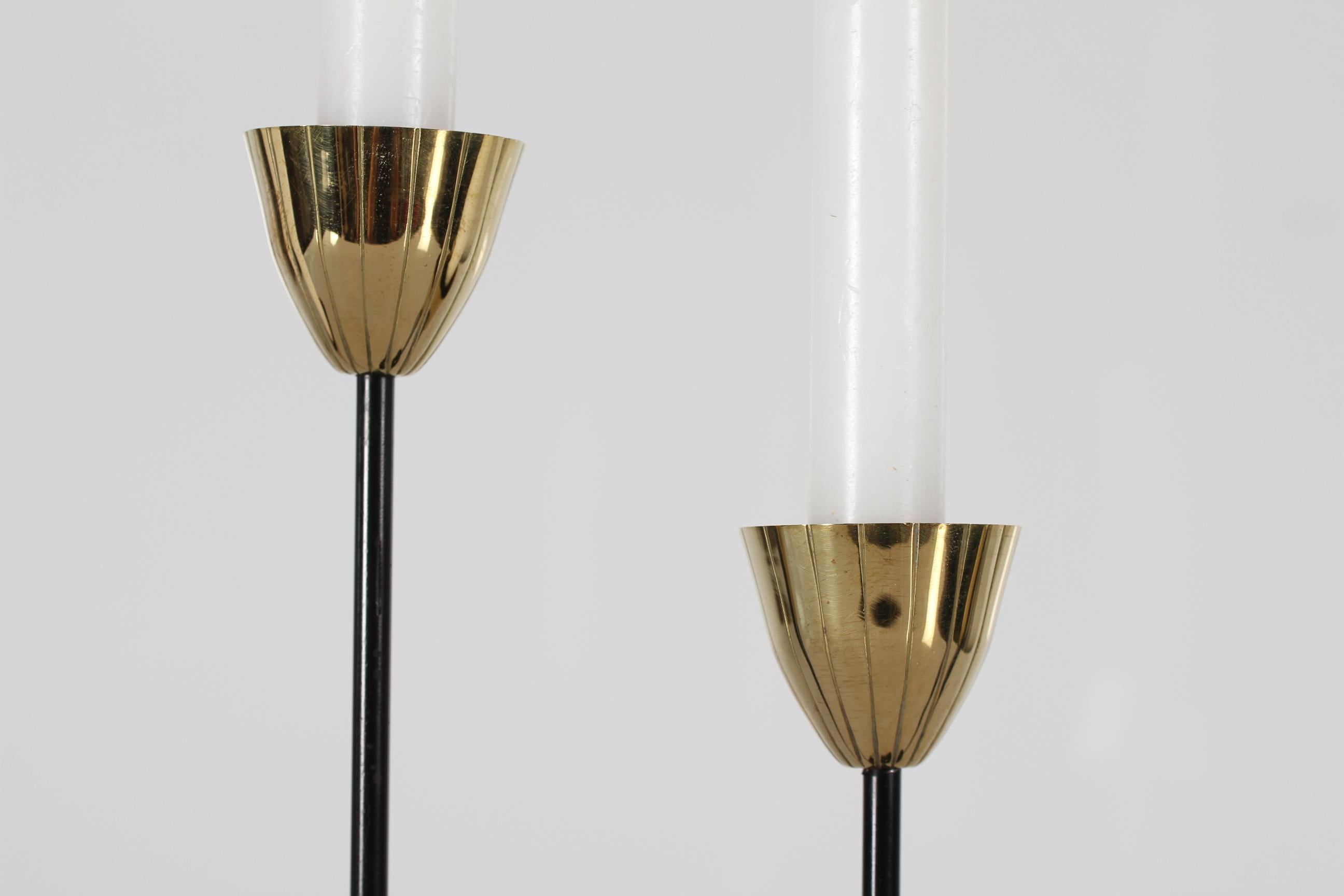 6 arm candelabra by Swedish designer Gunnar Ander (1908-1976) for Ystad Metall, Sweden.
The elegant candelabra is made of iron with black lacquer with flower shaped candleholders of brass.

Marked 