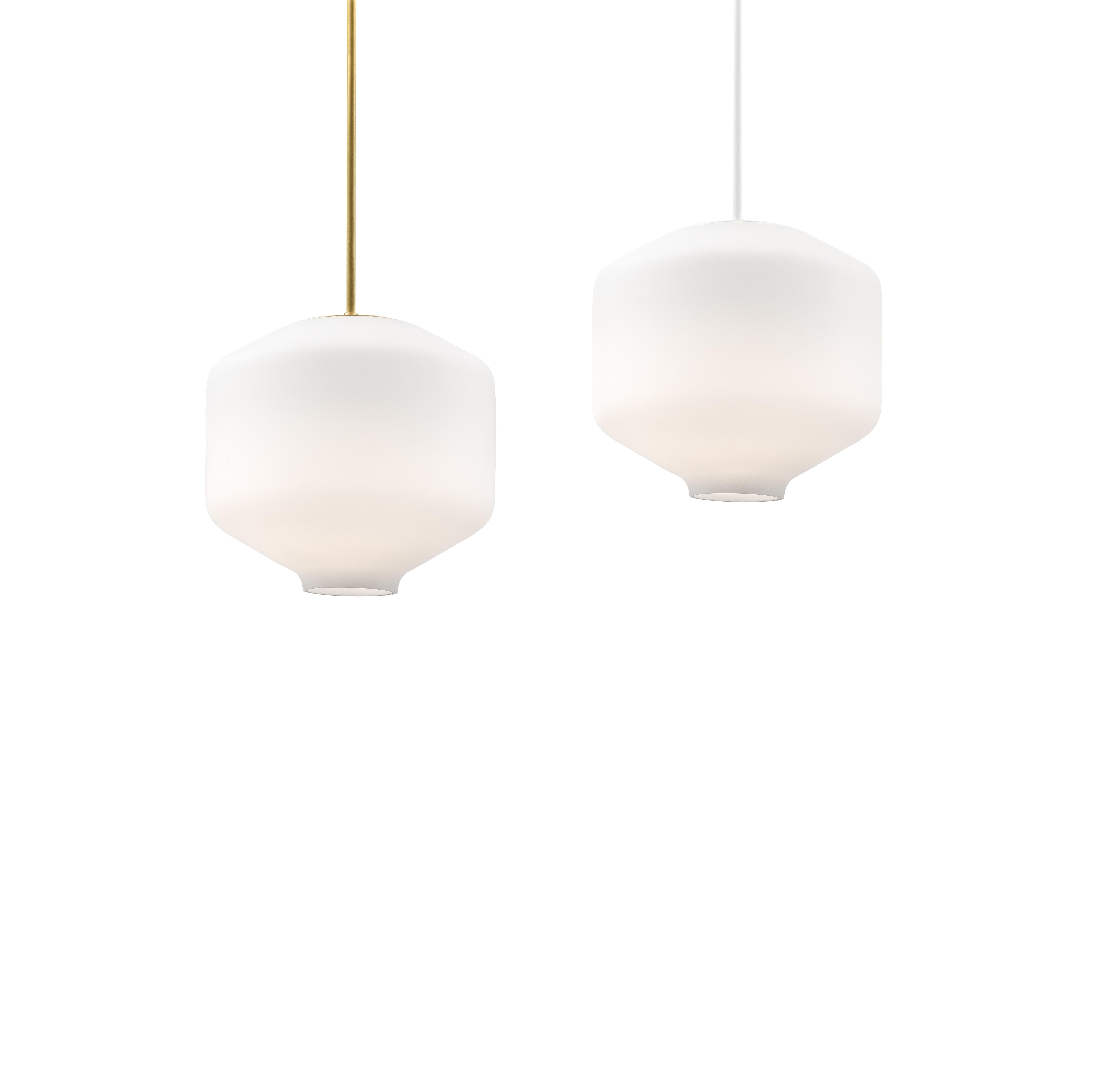GA7 is a classical globe luminaire and consists of a mouthblown, three layered opaque glass.

Originally designed to enlighten the corridors of the basement at the Woodland Cemetary.

The frosted glass in collaboration with the centered light
