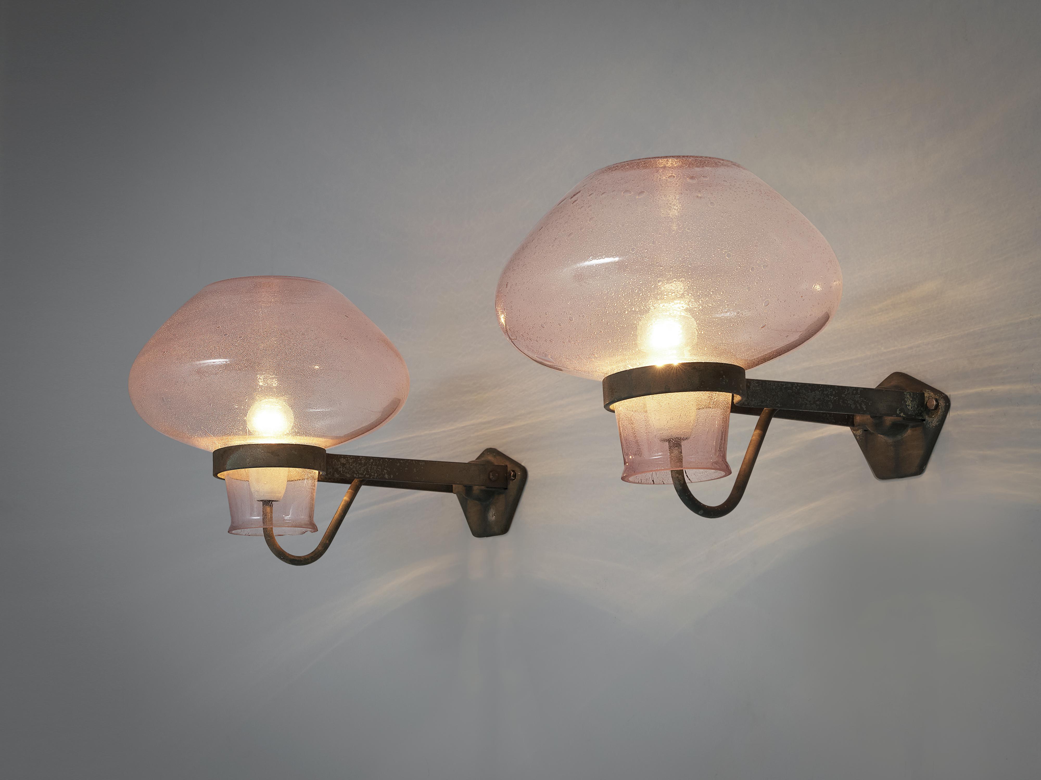 Gunnar Asplund for ASEA, pair of large wall lamps model 641, colored glass, metal, Sweden, 1930s

Swedish architect Gunnar Asplund (1885-1940) designed the originally for outdoor use intended lamps model 641 in the 1930s. With a diameter of 54cm