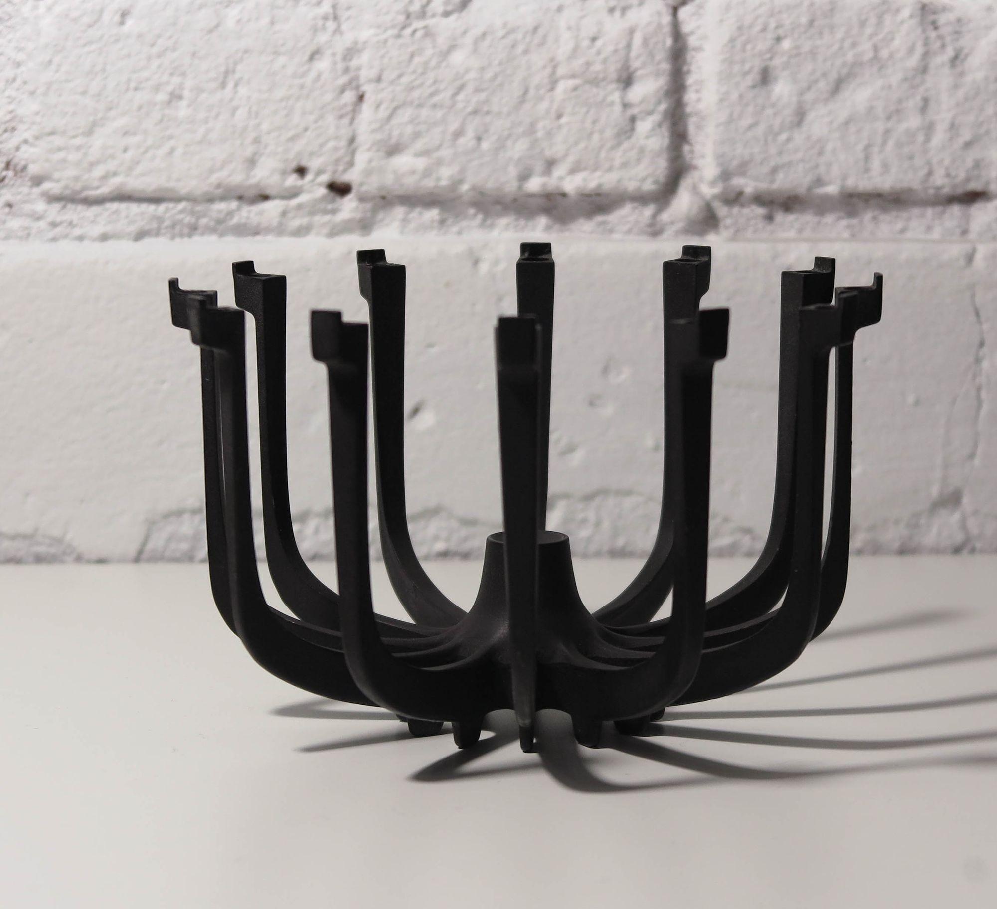 Danish cast iron candleholder designed by Gunnar Cyren, circa 1960 Denmark. Candle Holder features eight candles sticks. Excellent condition with minor signs of age and use.
Measurements
height 4.50''
diameter 7.25''.
