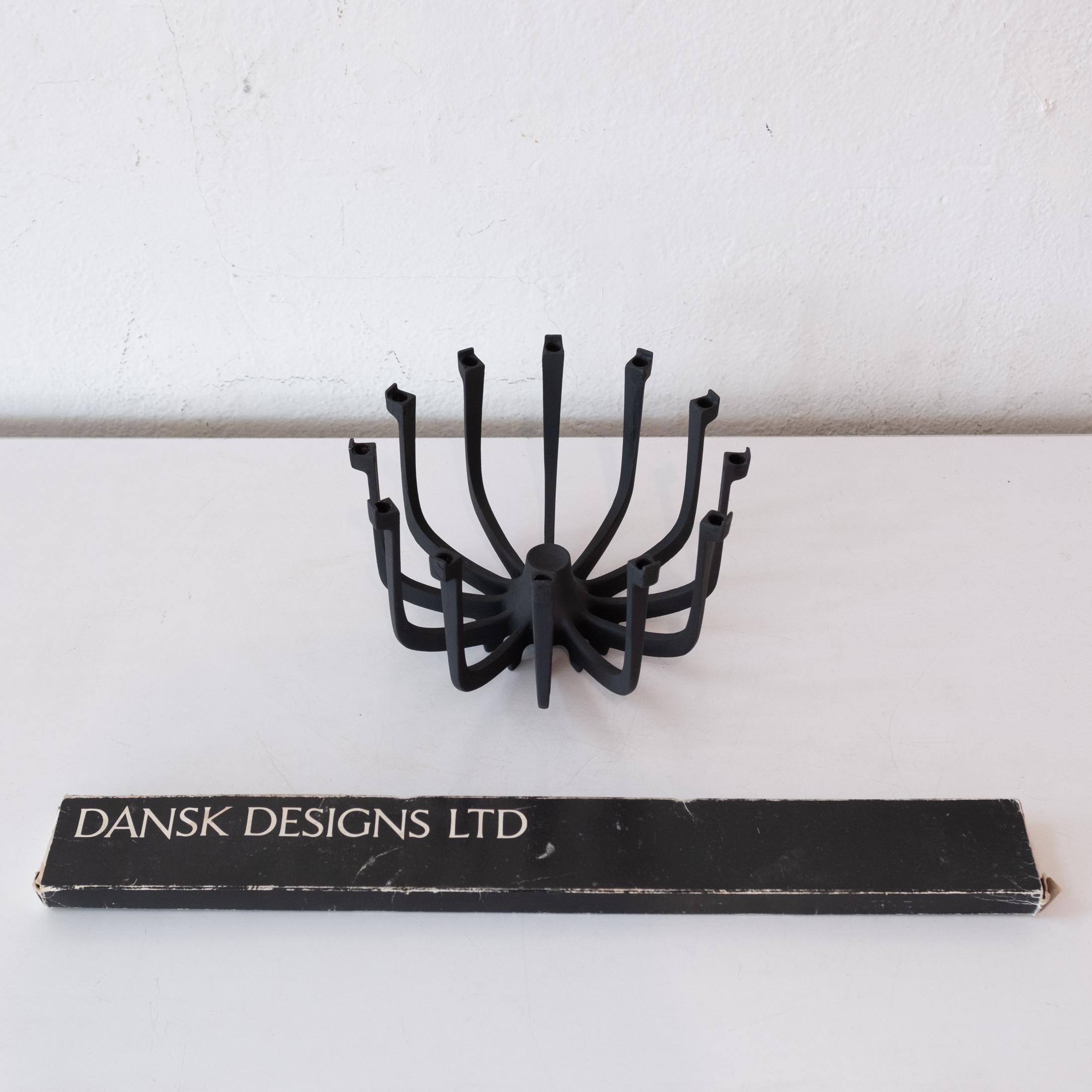 Gunnar Cyren designed iron candle holder by Dansk. Part of the Lysestager line. This is a rare form. Includes a box tapered Dansk candles.