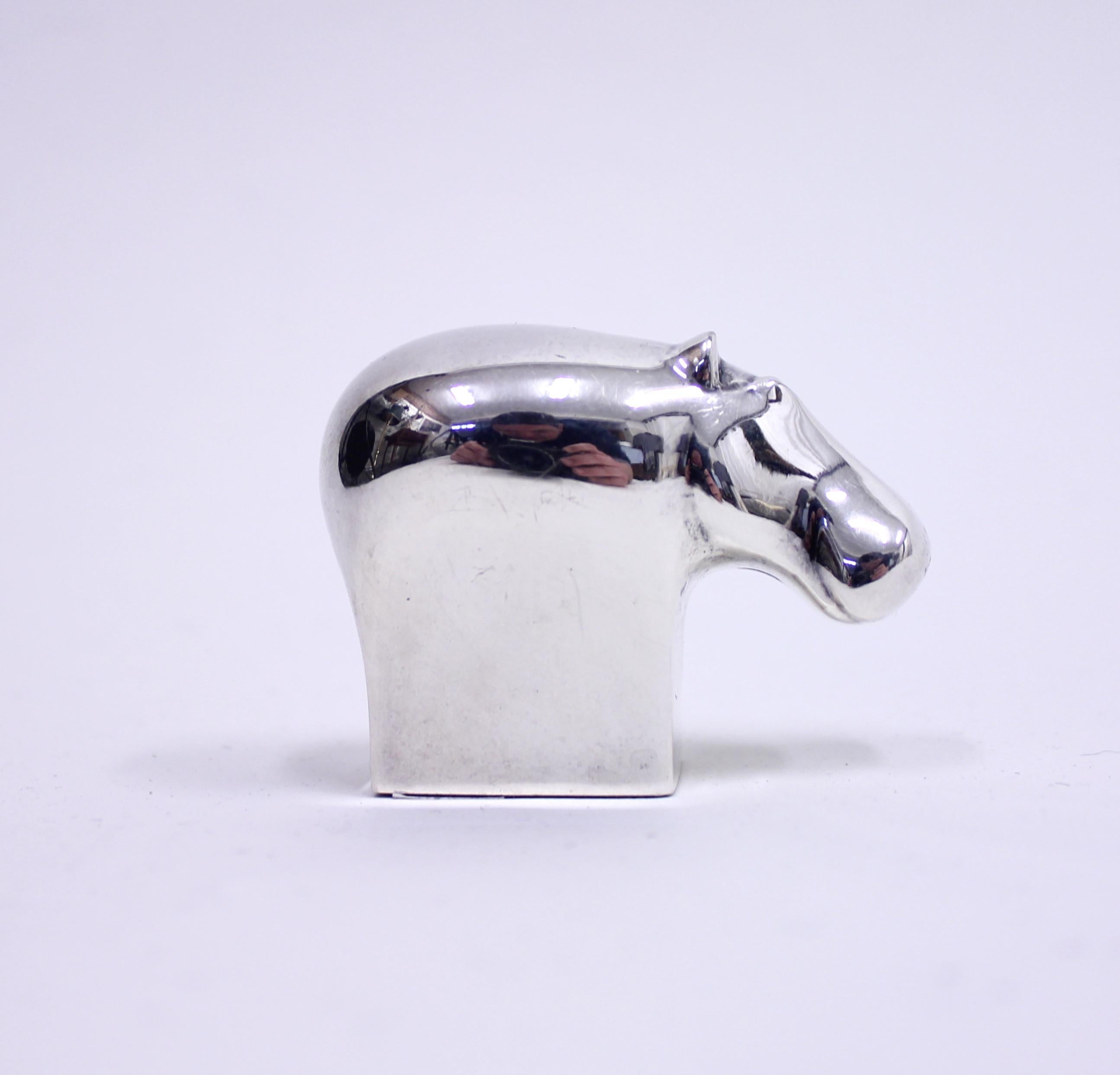Paperweight in silver plate on zink designed by Swedish designer Gunnar Cyrén for Dansk Designs Japan in the 1980s. Marked Dask Designs Japan GC under the base. Very good condition with light ware.