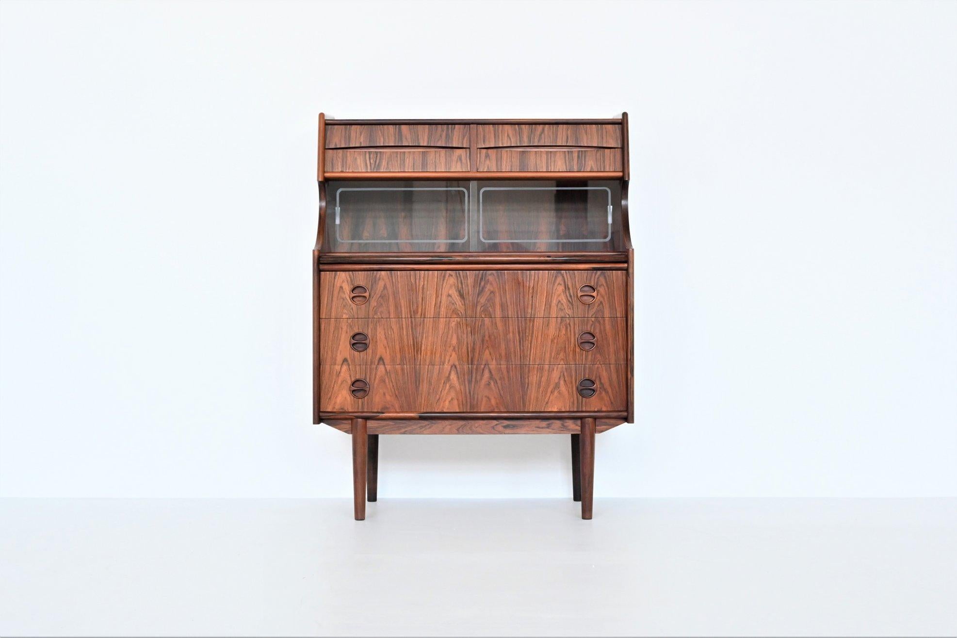 Beautiful Scandinavian secretary or writing desk designed by Gunnar Falsig for Holstebro Møbelfabrik, Denmark 1960. This very nice piece of Danish furniture is very functional with its plenty storage options and to use as a writing desk. The cabinet