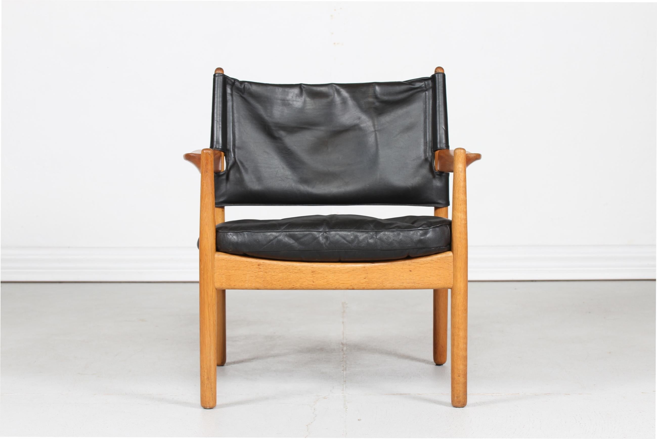 Scandinavian Modern Gunnar Myrstrand Easy Chair of Oak and Black Leather by Källemo, Sweden