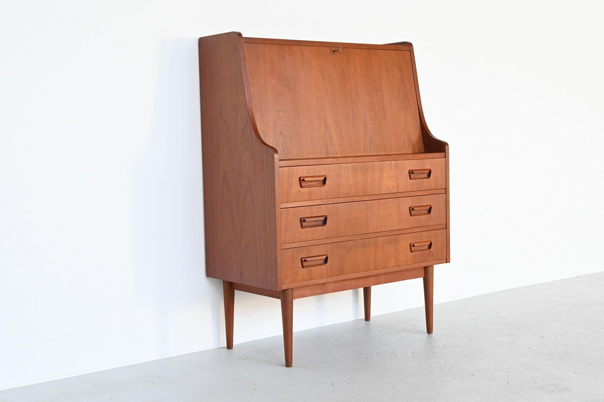 Beautiful Scandinavian Modern secretary or writing desk designed by Gunnar Nielsen Tibergaard for Tibergaard, Denmark, 1960. This very nice piece of Danish furniture is very functional with its plenty storage options and to use as a writing desk.