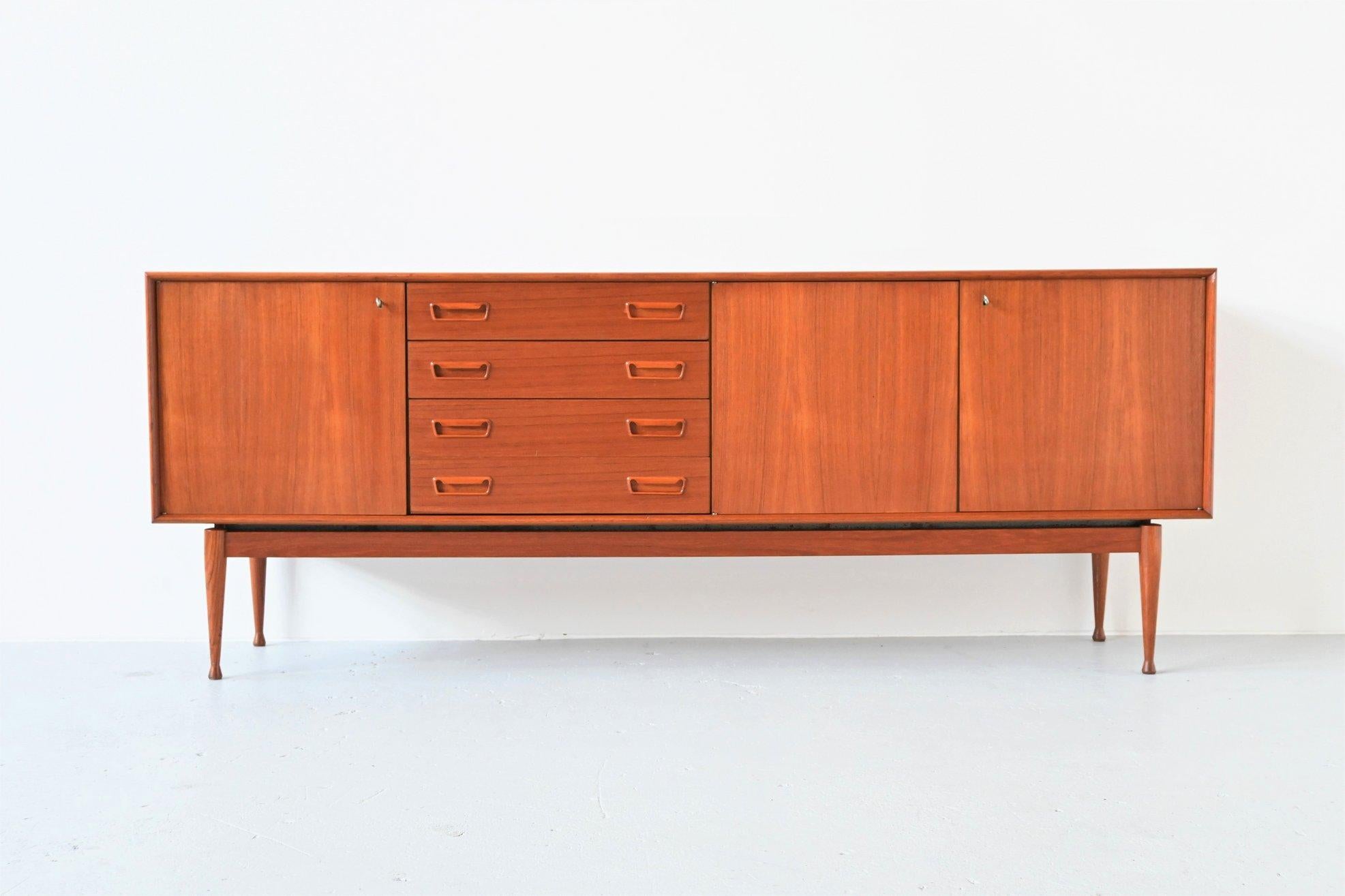 Stunning high quality sideboard designed by Gunnar Nielsen Tibergaard and manufactured by Tibergaard, Denmark 1960. This amazing credenza has a very nice teak grain and is in fully original condition. It’s a very nicely crafted piece of Danish